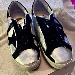 Golden Goose Super Stars. Laminated silver with black. Size 38.